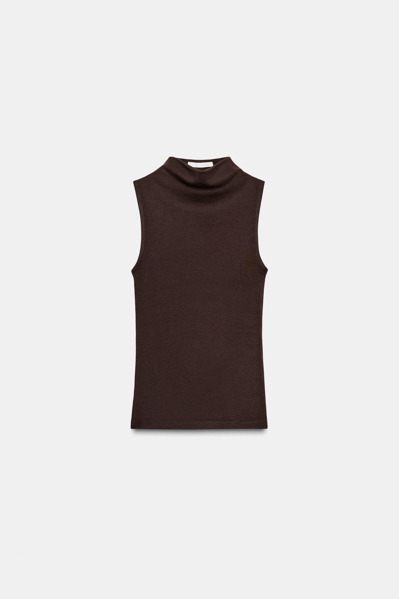 The Muse Ivory Sleeveless Mock Neck Top