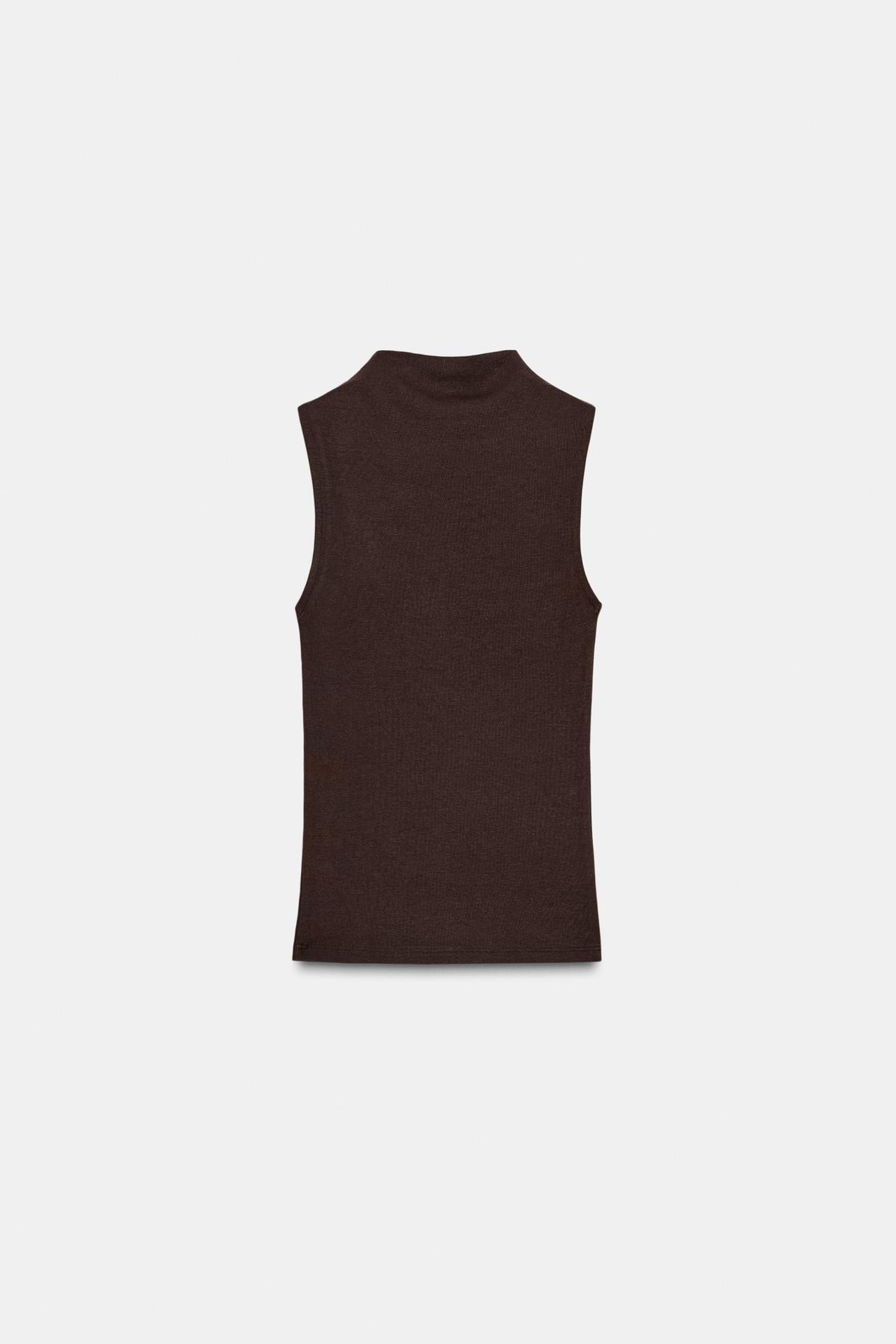 The Muse Ivory Sleeveless Mock Neck Top
