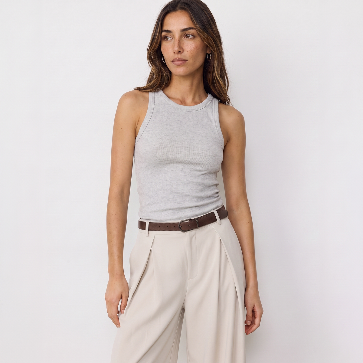 Women's beige maxi darted trousers with fluid wide leg and sculptural front drape by STATE OF HER