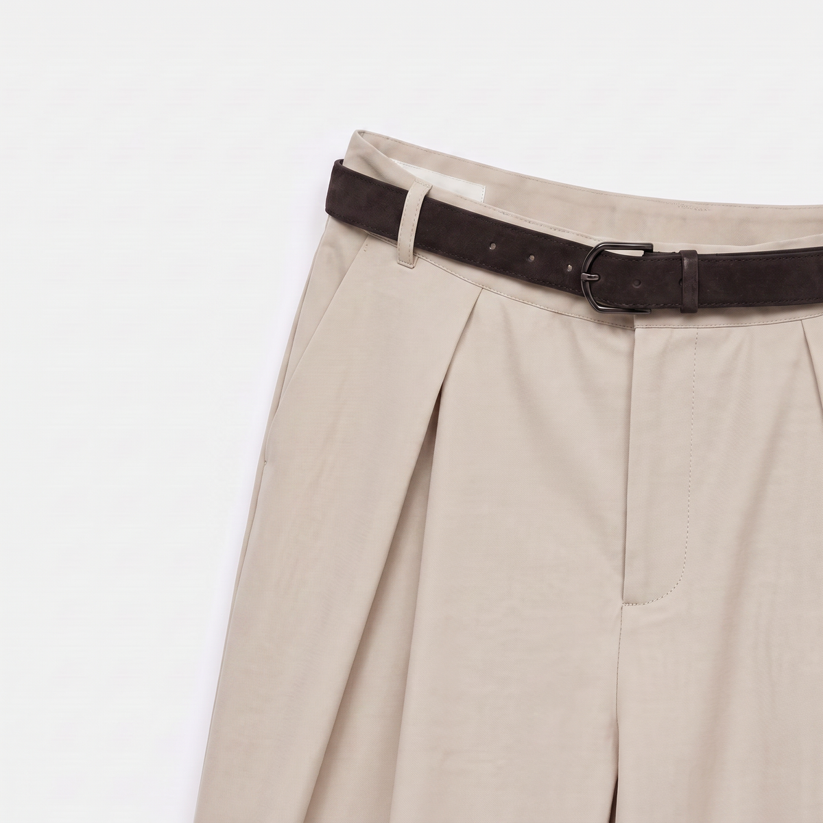 Women's beige maxi darted trousers with fluid wide leg and sculptural front drape by STATE OF HER
