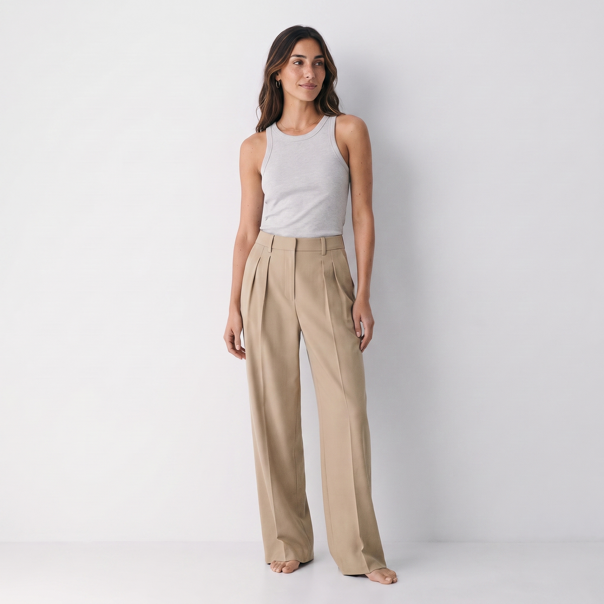 Women's beige wide-leg tailored trousers with double front pleats and fluid drape by STATE OF HER