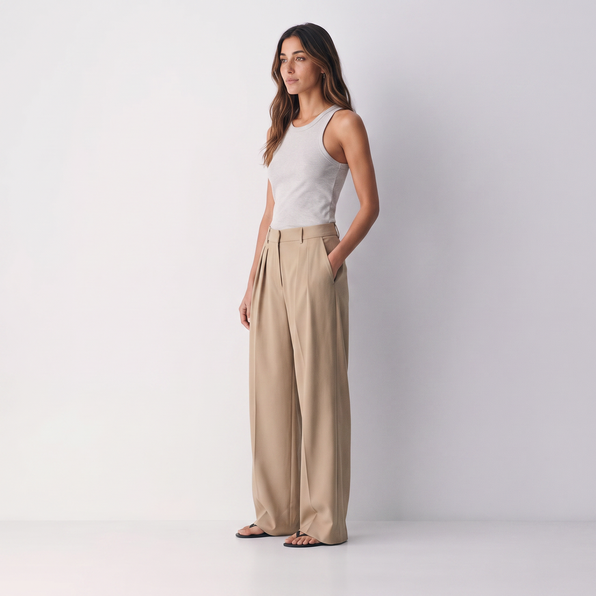Women's beige wide-leg tailored trousers with double front pleats and fluid drape by STATE OF HER