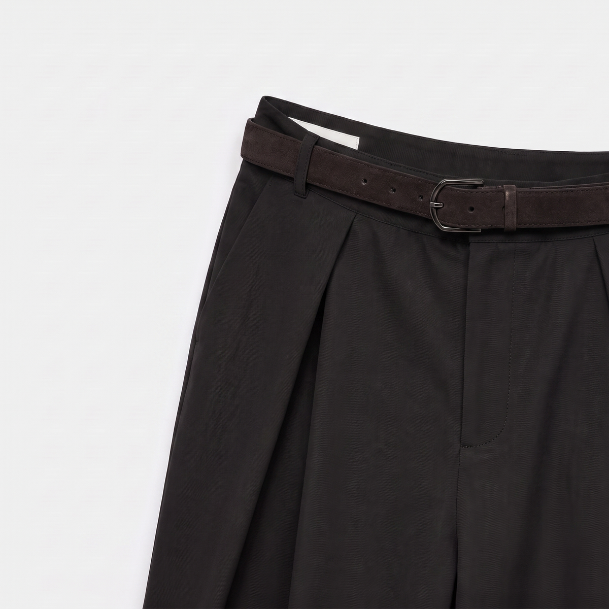 Women's black maxi darted trousers with fluid wide leg and sculptural front drape by STATE OF HER