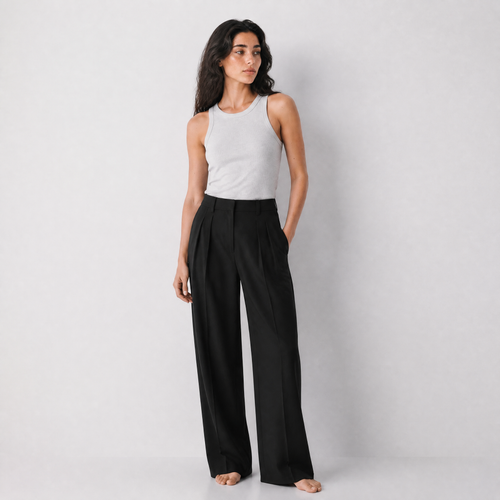 Women's black wide-leg tailored trousers with double front pleats and fluid drape by STATE OF HER