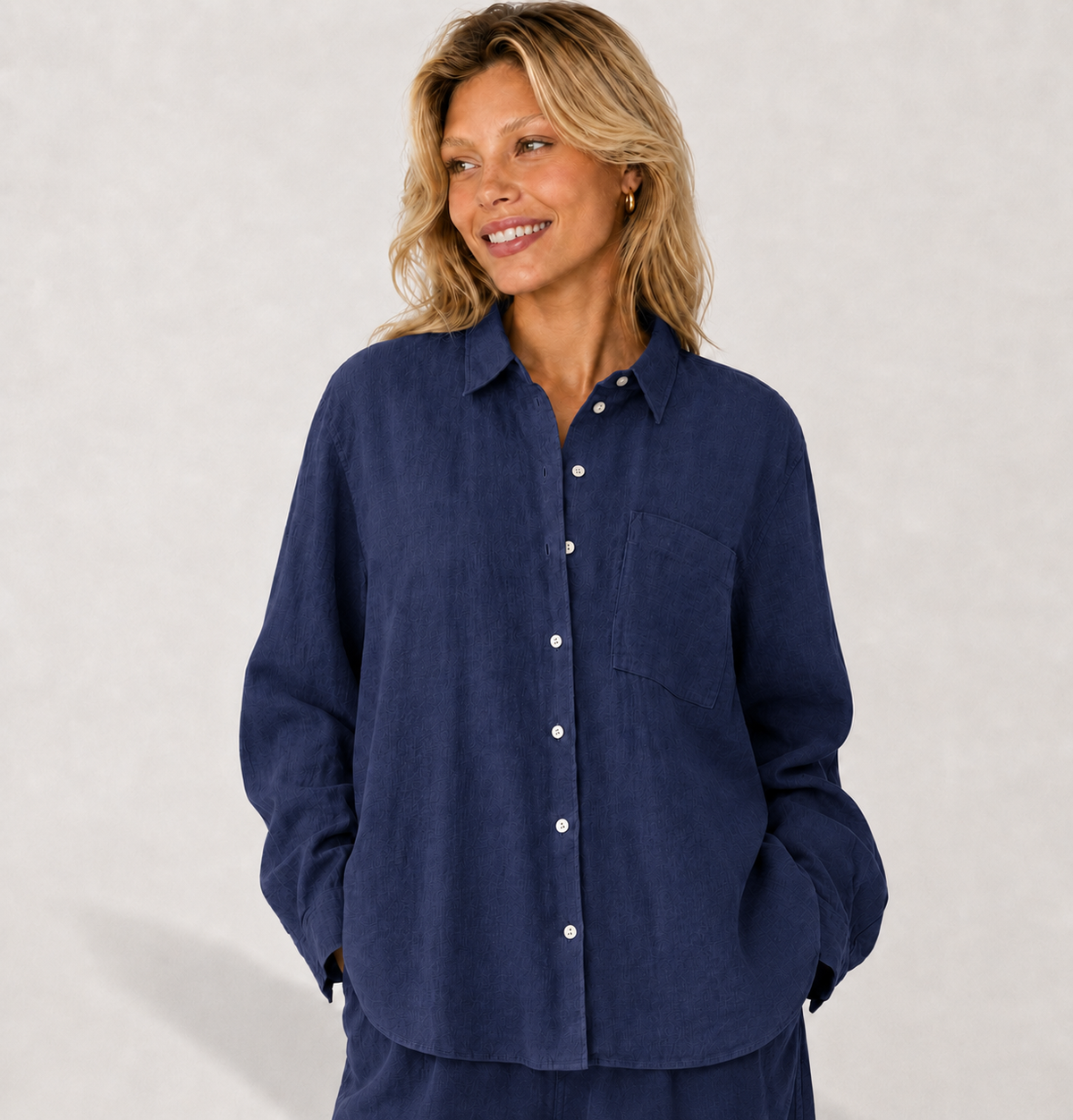 Women's blue oversized linen shirt with button front and dropped shoulders by STATE OF HER
