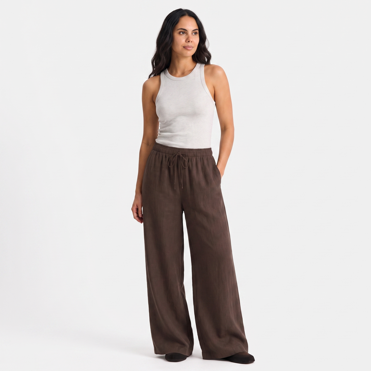 Women's brown linen straight-leg trousers with relaxed fit and pockets by STATE OF HER