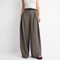 Women's brown maxi darted trousers with fluid wide leg and sculptural front drape by STATE OF HER