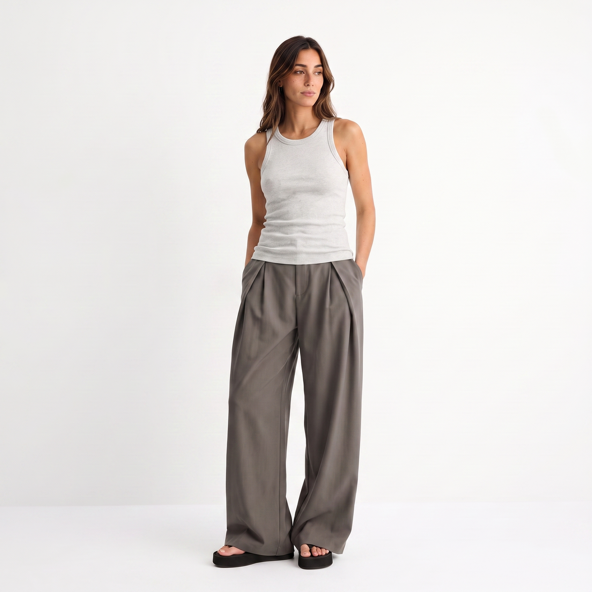 Women's brown maxi darted trousers with fluid wide leg and sculptural front drape by STATE OF HER