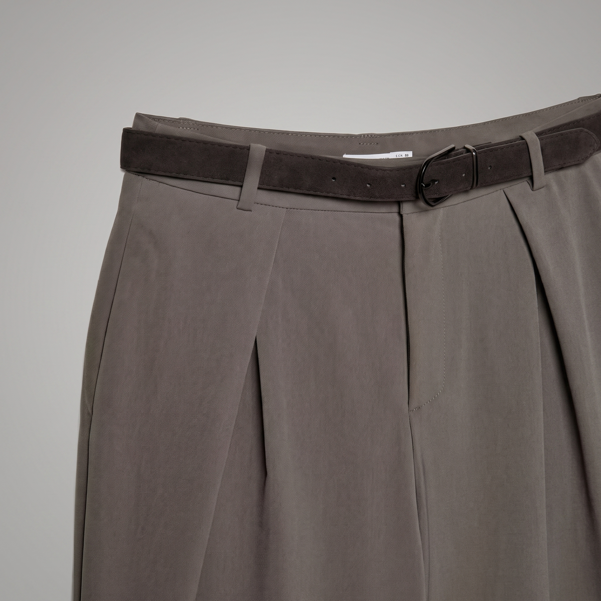 Women's brown maxi darted trousers with fluid wide leg and sculptural front drape by STATE OF HER