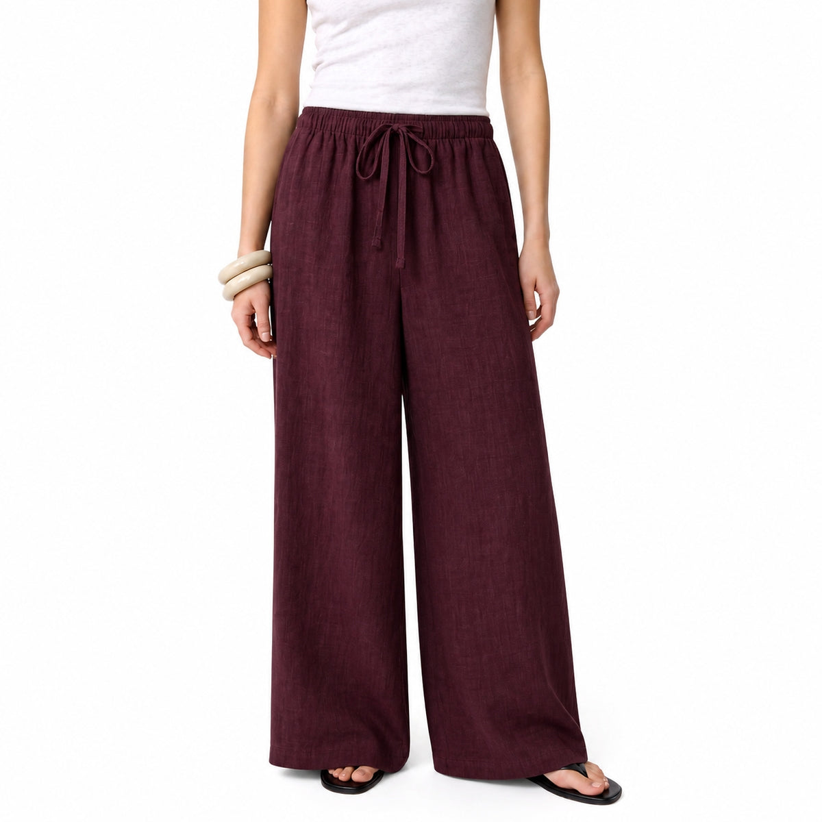 Women's burgundy linen straight-leg trousers with relaxed fit and pockets by STATE OF HER
