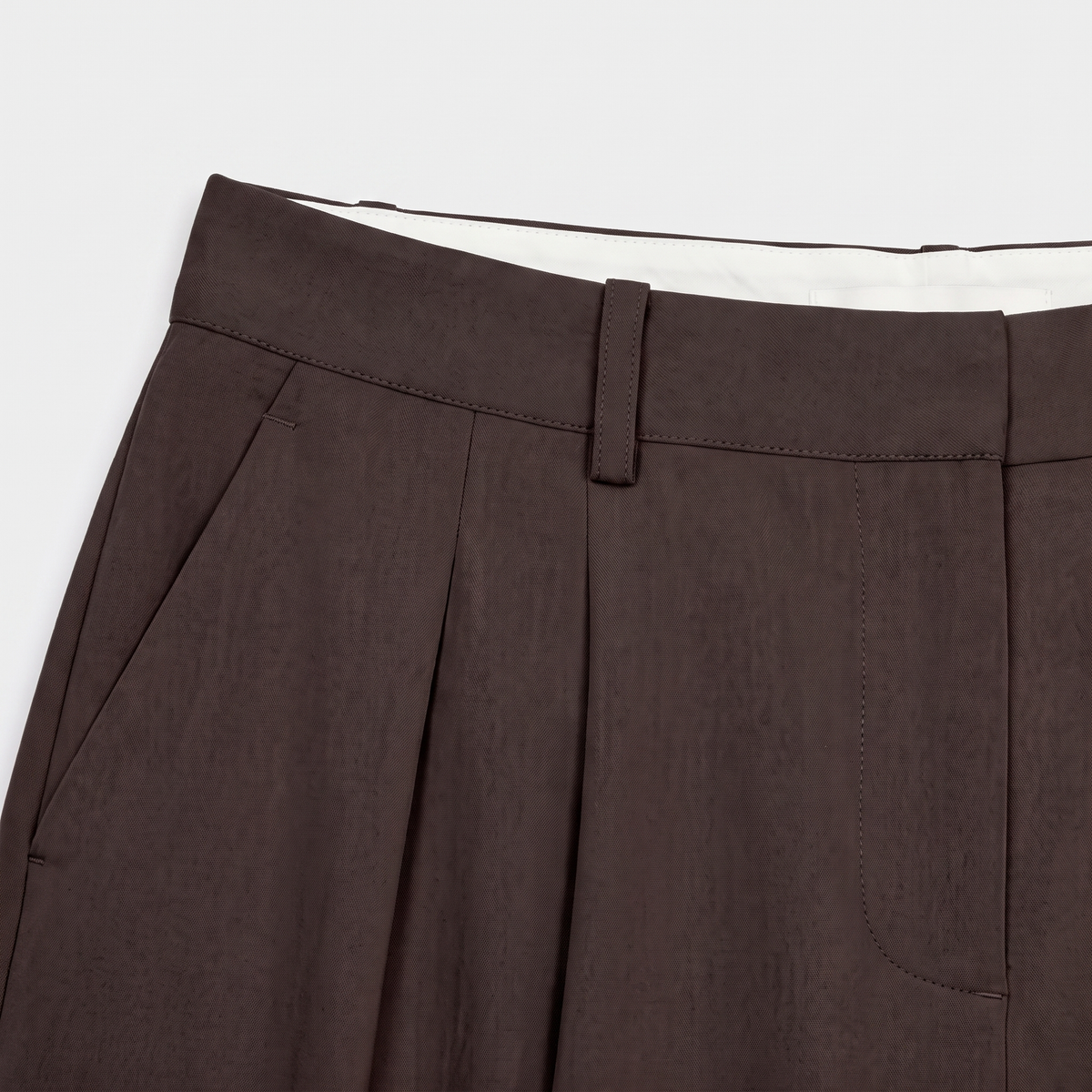 Women's dark brown wide-leg tailored trousers with double front pleats and fluid drape by STATE OF HER