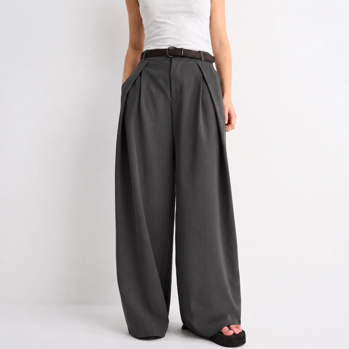 Women's gray maxi darted trousers with fluid wide leg and sculptural front drape by STATE OF HER