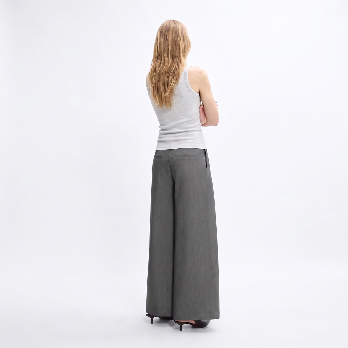 Women's gray maxi darted trousers with fluid wide leg and sculptural front drape by STATE OF HER