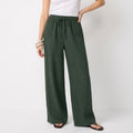 Women's green linen straight-leg trousers with relaxed fit and pockets by STATE OF HER
