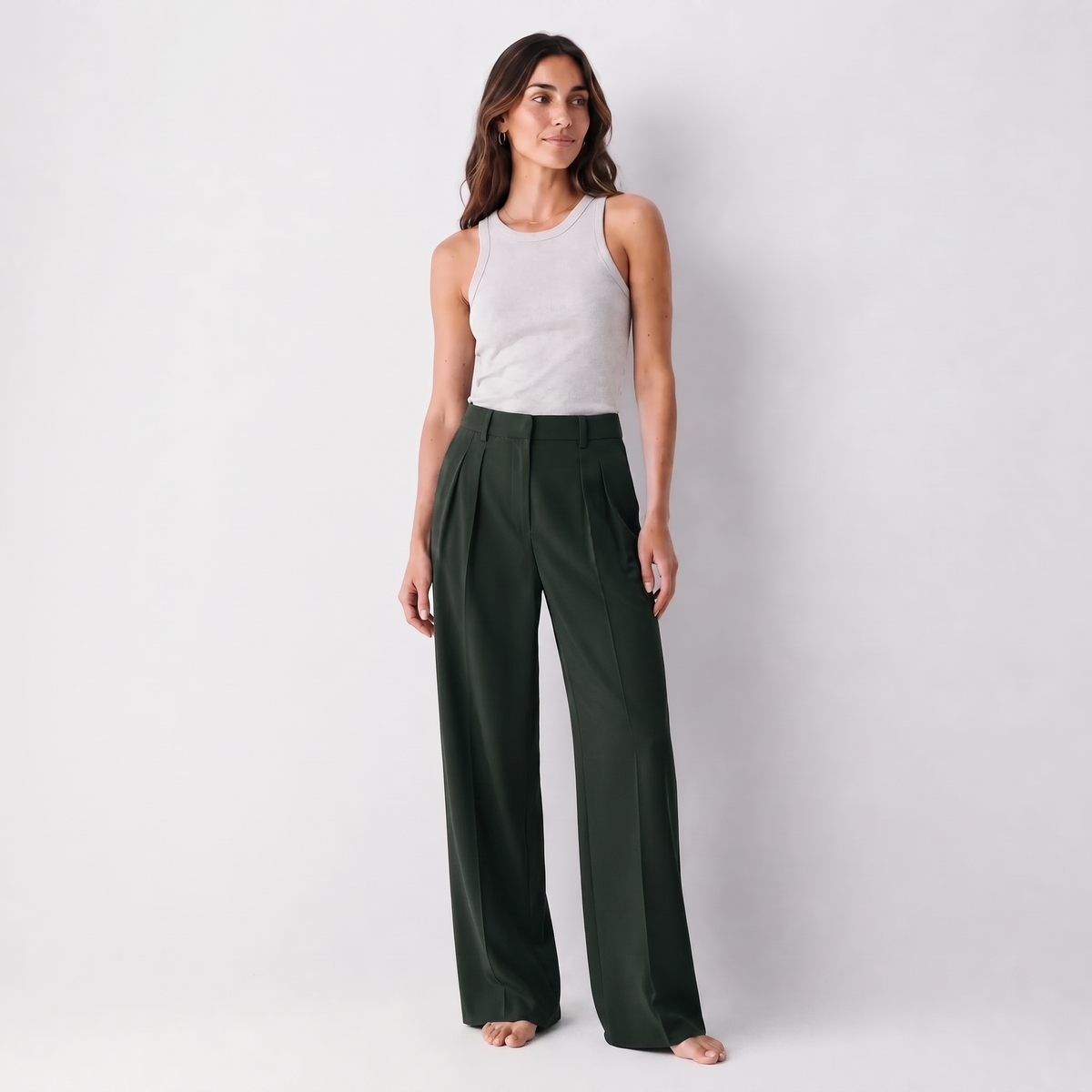 Women's green wide-leg tailored trousers with double front pleats and fluid drape by STATE OF HER