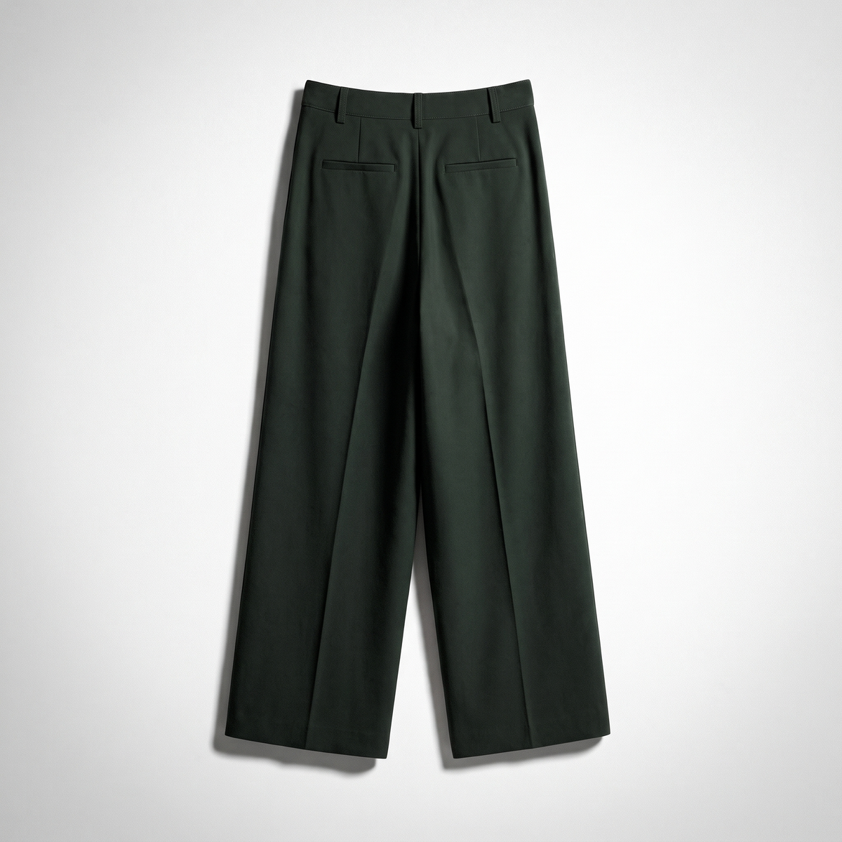 Women's green wide-leg tailored trousers with double front pleats and fluid drape by STATE OF HER