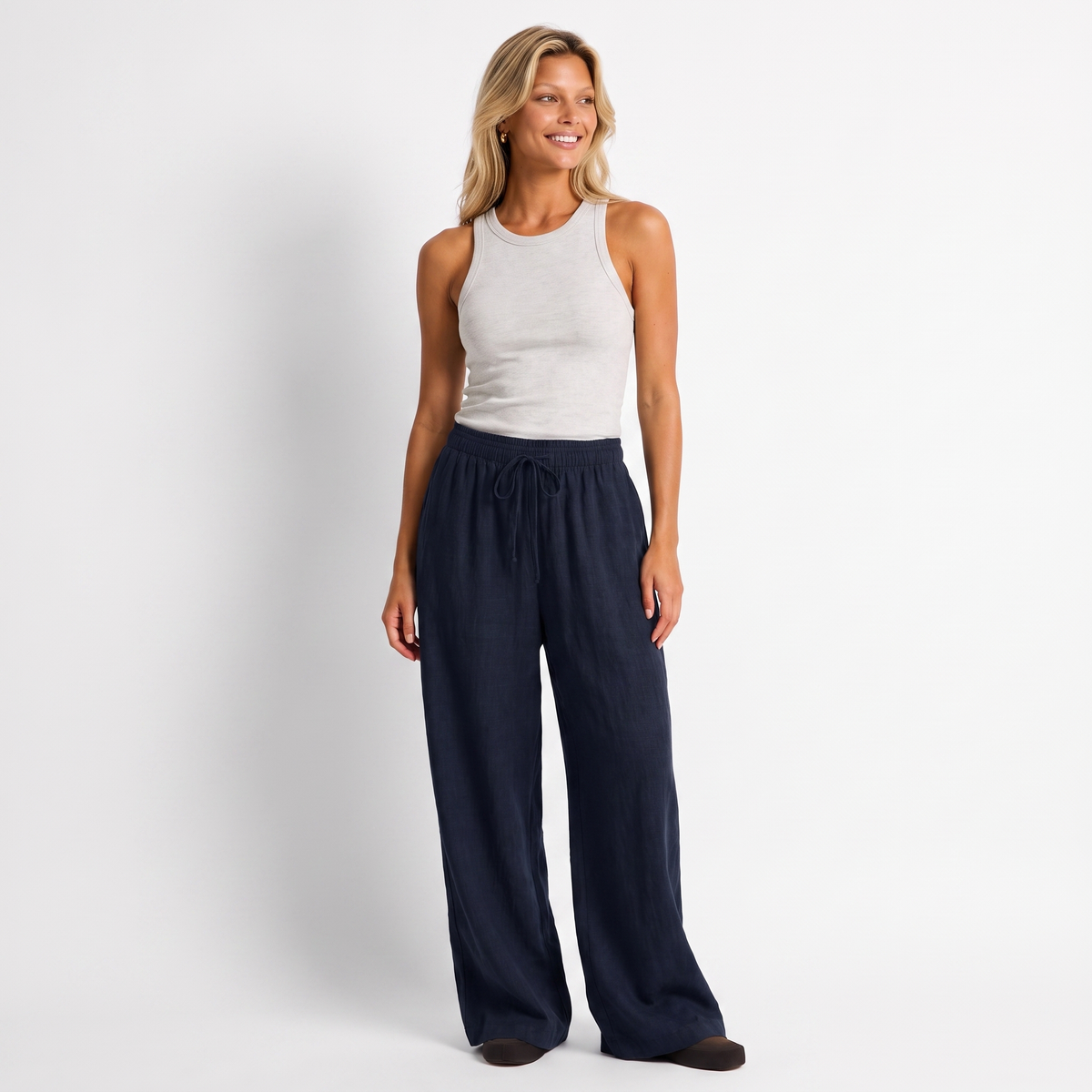 Women's navy linen straight-leg trousers with relaxed fit and pockets by STATE OF HER