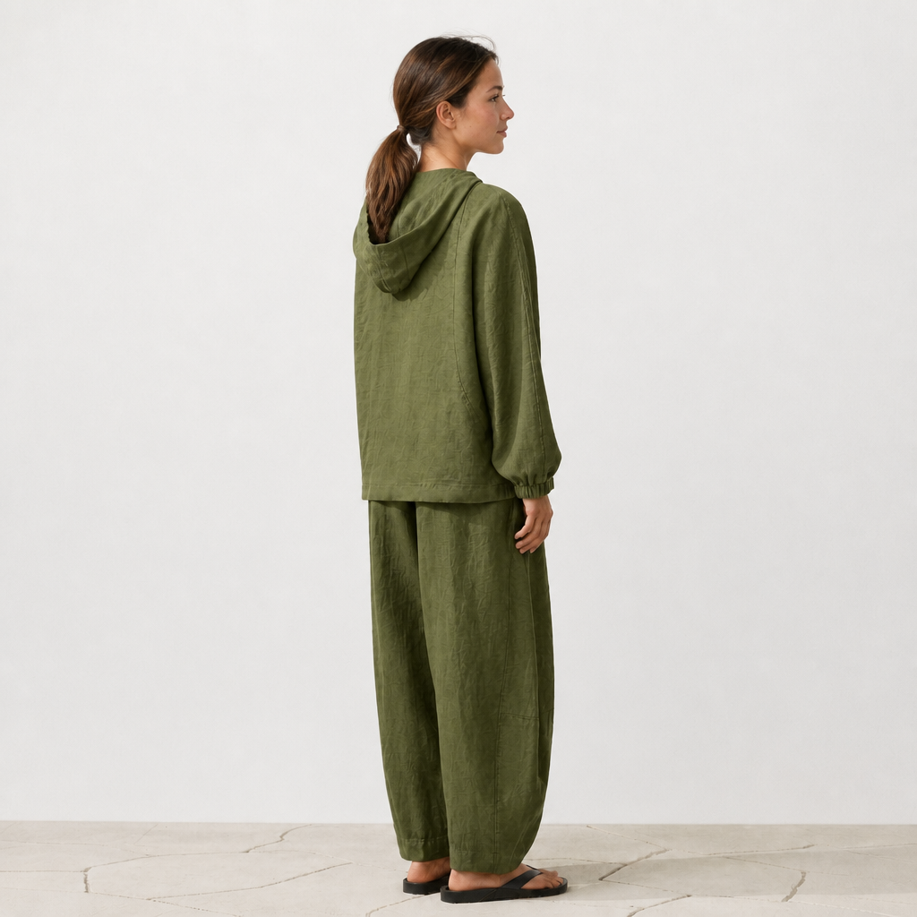 Women's olive linen hooded jacket with oversized fit and zip front by STATE OF HER