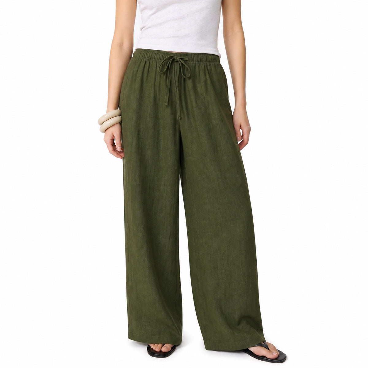 Women's olive linen straight-leg trousers with relaxed fit and pockets by STATE OF HER